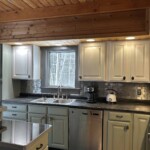 After: Sunbleached upper cabinets, evergreen fog lower cabinets and new hardware